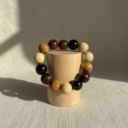 Earth tone multi bracelet on wood cylinder stand